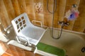 Swivel chair positioned on the bathtub