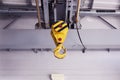 Swivel electric crane hook for overhead crane in the workshop Royalty Free Stock Photo