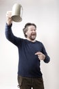 swooping nordic man toasting with beer mug