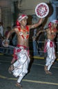 Sword Dancers perform along the streets of Kandy during the Esala Perahera in Sri Lanka.