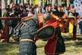 Sword fighting. Shield with the emblem of the historical club. Royalty Free Stock Photo