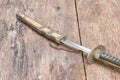 Sword steel blade samurai and scabbard easel ancient on old wooden surface floor with copy space Royalty Free Stock Photo
