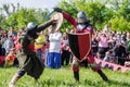 The swordfight heavily armed medieval warriors