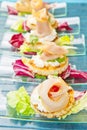 a glass dish with swordfish canape Royalty Free Stock Photo