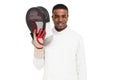 Swordsman holding fencing mask