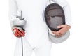 Swordsman holding fencing mask and sword Royalty Free Stock Photo