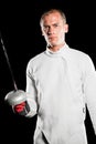 Swordsman holding fencing sword