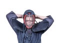 Swordsman wearing protective equipment for head `men` for Japan