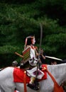 Swordswoman riding on horse at Jidai Matsuri parade, Japan.