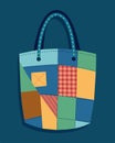 A sy tote bag made from repurposed denim jeans with a trendy patchwork design.. Vector illustration. Royalty Free Stock Photo
