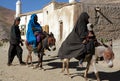 Syadara, Bamiyan Province, Afghanistan: Afghan family with donkeys Royalty Free Stock Photo