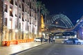 SYDNEY - AUGUST 17, 2018: Night view of The Rocks and Sydney Harbor Bridge. This district is a meeting point for young people Royalty Free Stock Photo