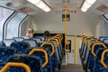 Sydney, Austraia 2021-10-17 Almost empty Sydney train carriage during Covid-19 pandemic. Passengers wearing face masks