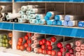 Defocused image of alcohol-based Copic sketch markers on display in a shelf at stationery art supplies shop.