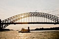 SYDNEY, AUSTRALIA - APRIL 13, 2019: Sunset scene of Sydney Harbour Bridge with passengers ferry in Sydney Harbour Australia