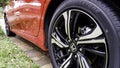 Close-up low angle view of the back wheel of a Honda Civic Royalty Free Stock Photo