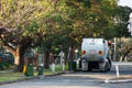 Australian garbage wheelie bins and a garbage truck on duty