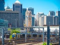 Sydney, Australia,Central Railway station, the image shows iconic historic clock tower at the center and cityscape.