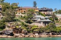 Upscale housing on rocky slope on northern shore of bay of Sydney, Australia