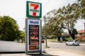 Entrance to 7 Eleven petrol service station and fuel prices