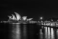 Sydney, Australia - January 11, 2009: Side view of Opera House from promenade at night. The Opera House is seen across the water Royalty Free Stock Photo