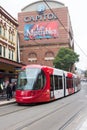 Tram driving past the Capitol theatre, CHinatown, Sydney, Australia