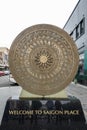 Circular street bronze monument in honor of the local Vietnamese community