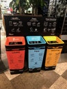 New rubbish bins for paper, glass and general litter with educational poster of how to properly