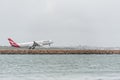 SYDNEY, AUSTRALIA - NOVEMBER 11, 2014: Sydney International Airport With Take Off Airplane. Qantas, Airbus A330-303, VH-QPC Royalty Free Stock Photo