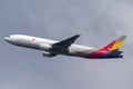 Asiana Airlines Boeing 777 large twin engine commercial aircraft taking off from Sydney Airport Royalty Free Stock Photo