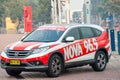 Honda car with signage for a Sydney radio station, Nova 96.9 parked at a fun running event