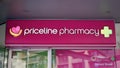 Priceline Pharmacy sign above the entrance to the drug store on Oxford Street in Sydney CBD.