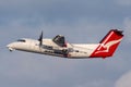 QantasLink Eastern Australia Airlines de Havilland Canada Dash 8 twin engine turboprop regional airliner aircraft taking off fro Royalty Free Stock Photo