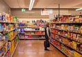Sydney, Australia 08-06-2019 A senior man surveying grocery aisle at ALDI