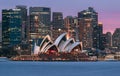Sydney Opera House Australian iconic with city cbd and beautiful sunset color in sky