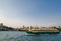 Sydney harbour with the ferry in sunset lights and cityscape view behind. Royalty Free Stock Photo