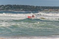 Surf rescue life savers training in progress. Surf rescue boat jumping on the waves at Wanda Beach, Royalty Free Stock Photo