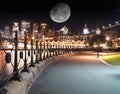 Sydney CBD illuminated by the moon and circular quay with vibrant colours NSW Australia