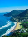 Sydney cliffs off Wollongong Australia on a sunny clear blue sky day with the turquoise colours of the bay