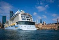 The Cruise ship, Ovation of the Seas, looms over the buildings in the Circular Bay harbor area, Sydney, Australia Royalty Free Stock Photo