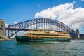 Sydney ferry in front of Sydney Harbour Bridge
