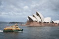 Sydney ferry in Sydney Harbour with Sydney Opera House on the background Royalty Free Stock Photo