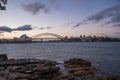 Sydney harbor skyline at sunset with Sydney harbor bridge, NSW, Australia Royalty Free Stock Photo