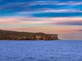 Sydney Harbour Australia at Sunset, lovely coloured skies boats ferries cruise liners houses and buildings