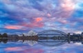 Sydney Harbour Australia at Sunset with the reflection of the Buildings and high rise offices of the City in the water Royalty Free Stock Photo