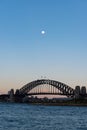 Sydney Harbour Bridge on dusk with full moon above