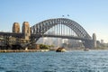 Sydney Harbour Bridge with ferries and Sydney North buildings Royalty Free Stock Photo