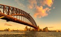 Sydney Harbour Bridge and Opera House at golden sunset Royalty Free Stock Photo