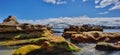 Sydney Harbour with nice rocks in the foreground the soft waves crashing on the shore NSW Australia