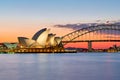 Sydney. New South Wales. Australia. The Opera House at sunset and the harbour bridge Royalty Free Stock Photo